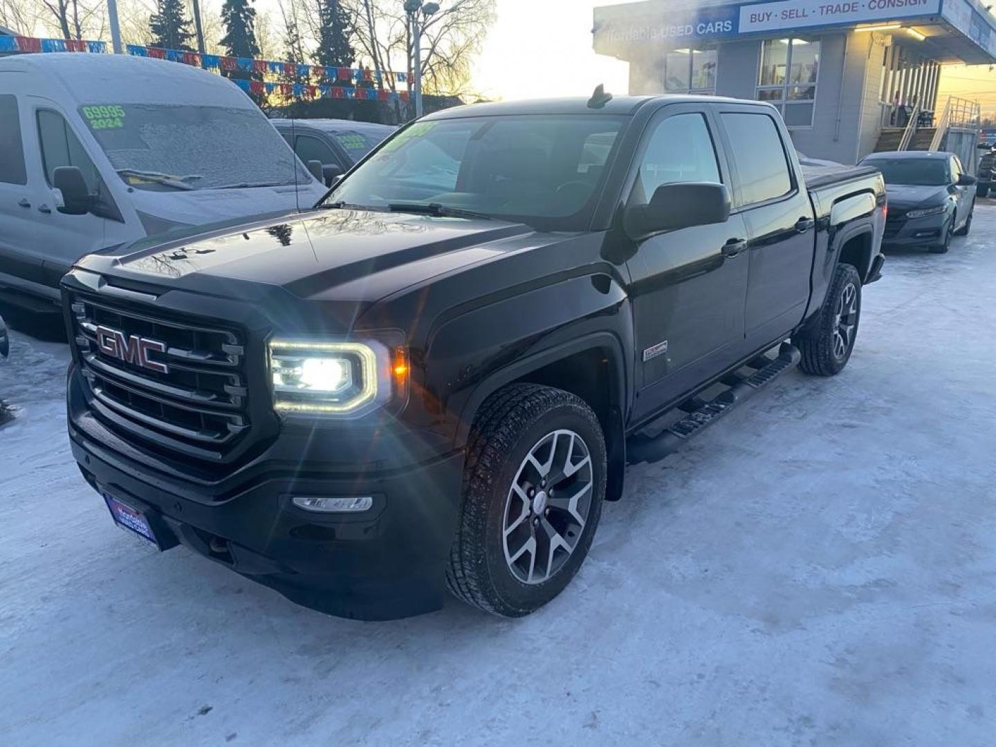 2017 BLACK GMC SIERRA 1500 SLT (3GTU2NEC3HG) with an 5.3L engine, Automatic transmission, located at 929 East 8th Ave, Anchorage, AK, 99501, (907) 274-2277, 61.214783, -149.866074 - Photo#0