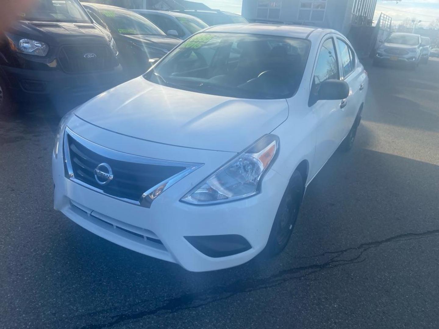 2015 WHITE NISSAN VERSA S (3N1CN7AP8FL) with an 1.6L engine, Continuously Variable transmission, located at 929 East 8th Ave, Anchorage, AK, 99501, (907) 274-2277, 61.214783, -149.866074 - Photo#0