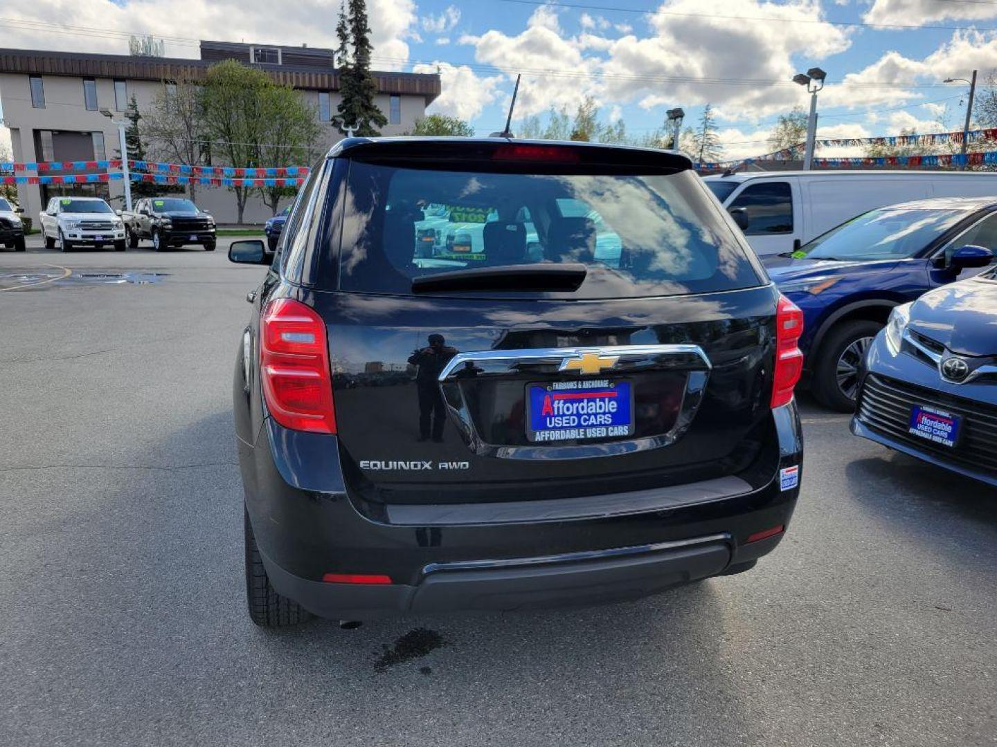 2017 BLACK CHEVROLET EQUINOX LS (2GNFLEEK1H6) with an 2.4L engine, Automatic transmission, located at 929 East 8th Ave, Anchorage, AK, 99501, (907) 274-2277, 61.214783, -149.866074 - Photo#2