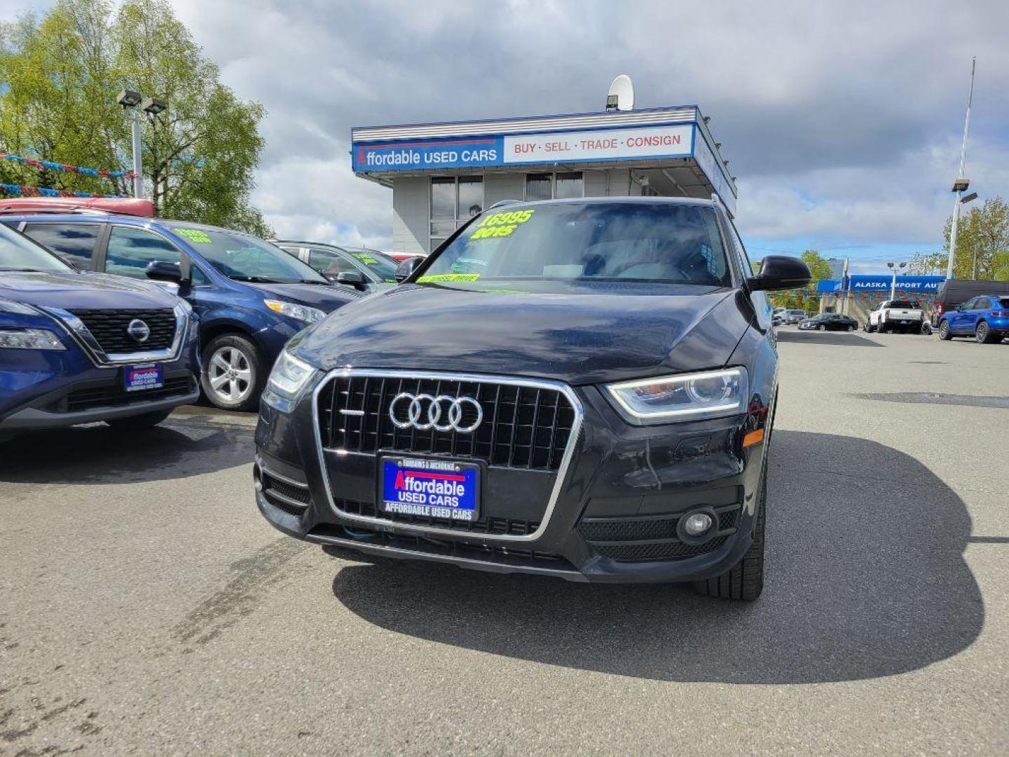 2015 BLACK AUDI Q3 PREMIUM PLUS (WA1EFCFS3FR) with an 2.0L engine, Automatic transmission, located at 929 East 8th Ave, Anchorage, AK, 99501, (907) 274-2277, 61.214783, -149.866074 - Photo#0