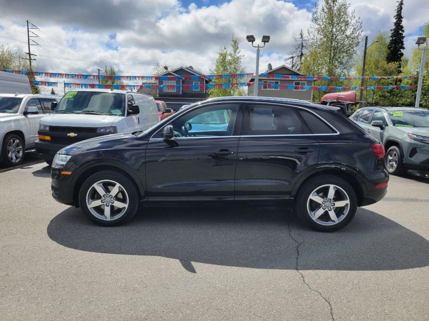 2015 BLACK AUDI Q3 PREMIUM PLUS (WA1EFCFS3FR) with an 2.0L engine, Automatic transmission, located at 929 East 8th Ave, Anchorage, AK, 99501, (907) 274-2277, 61.214783, -149.866074 - Photo#1