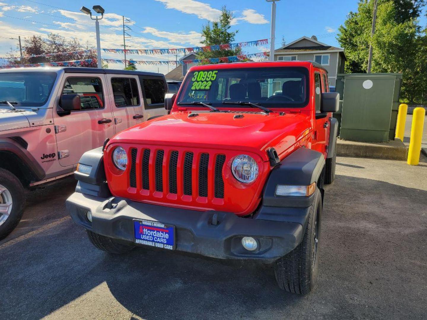 2022 RED JEEP WRANGLER UNLIMI SPORT (1C4HJXDG1NW) with an 3.6L engine, Automatic transmission, located at 929 East 8th Ave, Anchorage, AK, 99501, (907) 274-2277, 61.214783, -149.866074 - Photo#4