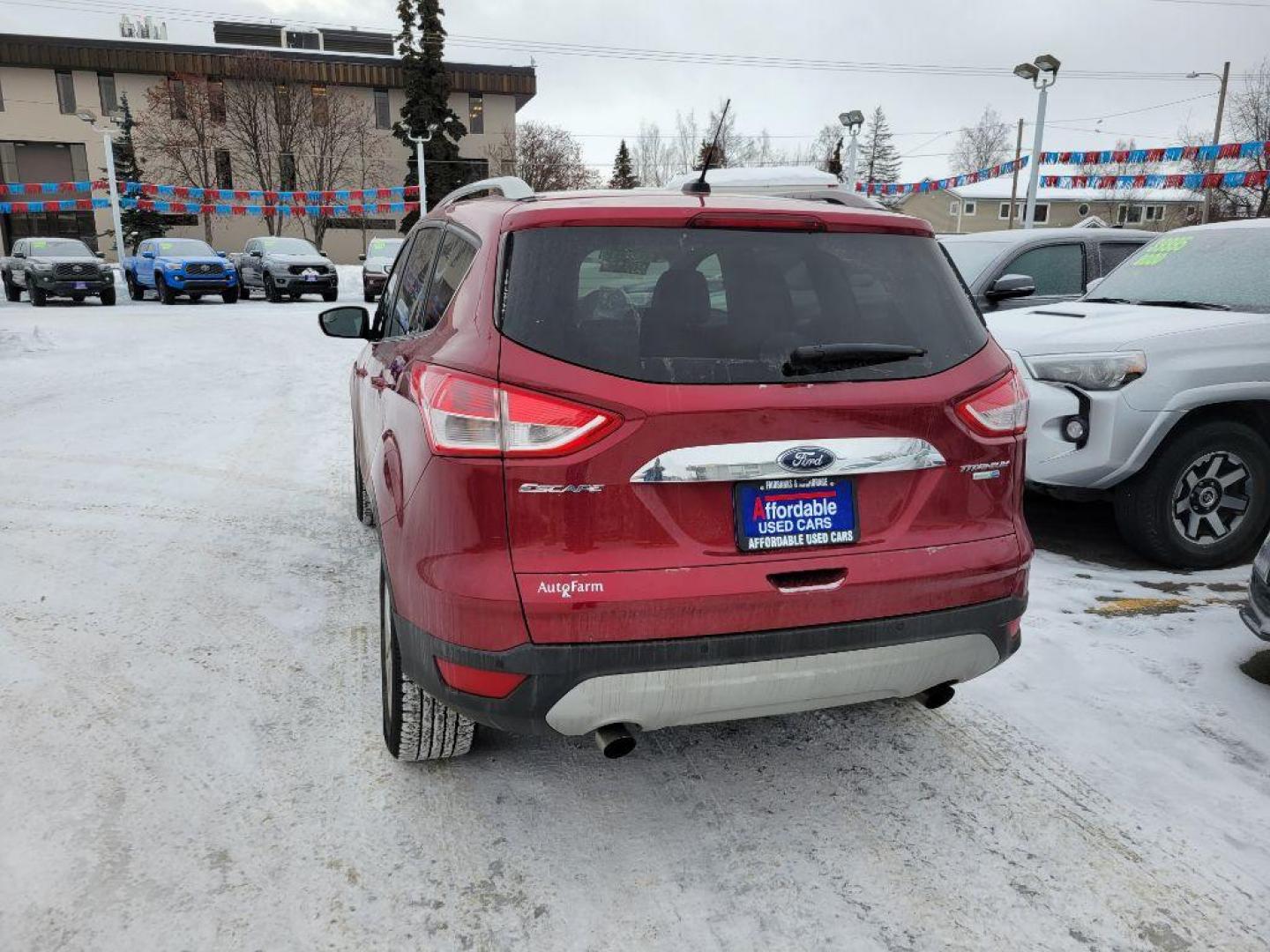 2015 RED FORD ESCAPE TITANIUM (1FMCU9JX9FU) with an 1.6L engine, Automatic transmission, located at 929 East 8th Ave, Anchorage, AK, 99501, (907) 274-2277, 61.214783, -149.866074 - Photo#2