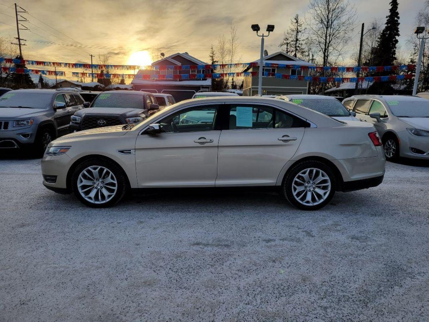 2017 GOLD FORD TAURUS LIMITED (1FAHP2F84HG) with an 3.5L engine, Automatic transmission, located at 929 East 8th Ave, Anchorage, AK, 99501, (907) 274-2277, 61.214783, -149.866074 - Photo#1