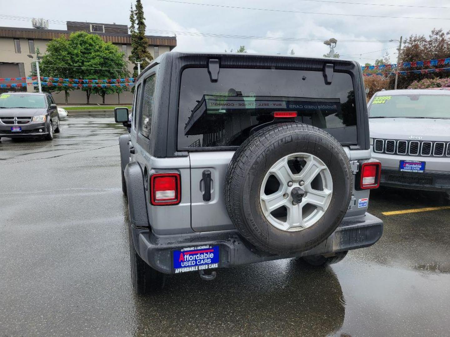 2021 SILVER JEEP WRANGLER UNLIMI SPORT (1C4HJXDNXMW) with an 2.0L engine, Automatic transmission, located at 929 East 8th Ave, Anchorage, AK, 99501, (907) 274-2277, 61.214783, -149.866074 - Photo#2