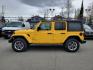 2020 YELLOW JEEP WRANGLER UNLIMI SAHARA (1C4HJXEN2LW) with an 2.0L engine, Automatic transmission, located at 929 East 8th Ave, Anchorage, AK, 99501, (907) 274-2277, 61.214783, -149.866074 - Photo#1