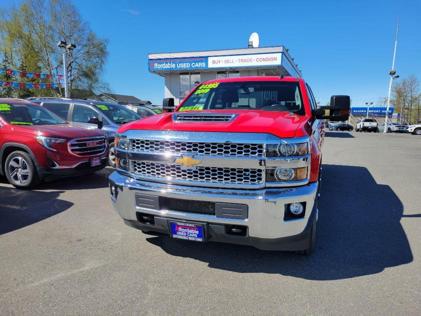 2019 RED CHEVROLET SILVERADO 2500 HEAVY DUTY LT (1GC1KSEY5KF) with an 6.6L engine, Automatic transmission, located at 929 East 8th Ave, Anchorage, AK, 99501, (907) 274-2277, 61.214783, -149.866074 - Photo#0