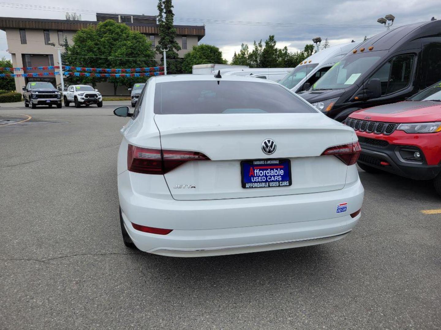 2020 WHITE VOLKSWAGEN JETTA SEL (3VWE57BUXLM) with an 1.4L engine, Automatic transmission, located at 929 East 8th Ave, Anchorage, AK, 99501, (907) 274-2277, 61.214783, -149.866074 - Photo#2