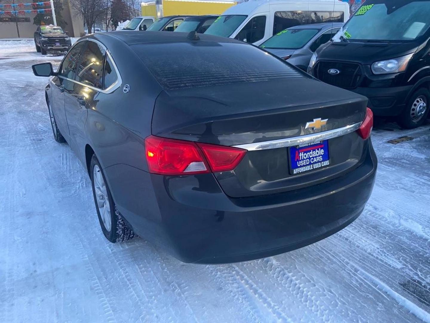 2014 BLACK CHEVROLET IMPALA LT (2G1125S34E9) with an 3.6L engine, Automatic transmission, located at 929 East 8th Ave, Anchorage, AK, 99501, (907) 274-2277, 61.214783, -149.866074 - Photo#1