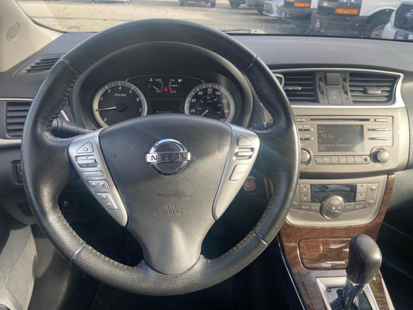 2014 BLACK NISSAN SENTRA S (3N1AB7AP8EY) with an 1.8L engine, Continuously Variable transmission, located at 929 East 8th Ave, Anchorage, AK, 99501, (907) 274-2277, 61.214783, -149.866074 - Photo#4