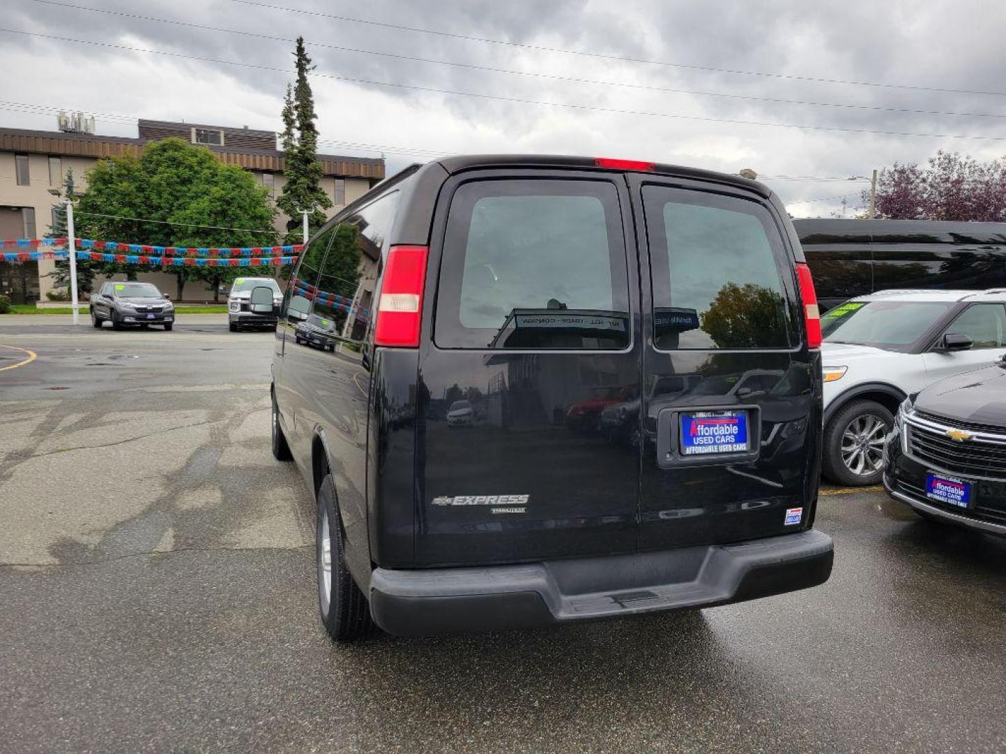 2013 BLACK CHEVROLET EXPRESS G3500 (1GCZGUCA1D1) with an 4.8L engine, Automatic transmission, located at 929 East 8th Ave, Anchorage, AK, 99501, (907) 274-2277, 61.214783, -149.866074 - Photo#2