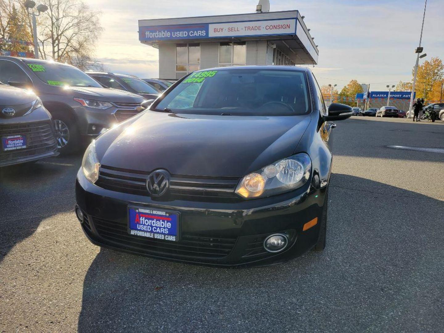 2014 BLACK VOLKSWAGEN GOLF (WVWDM7AJ9EW) with an 2.0L engine, Automatic transmission, located at 929 East 8th Ave, Anchorage, AK, 99501, (907) 274-2277, 61.214783, -149.866074 - Photo#0