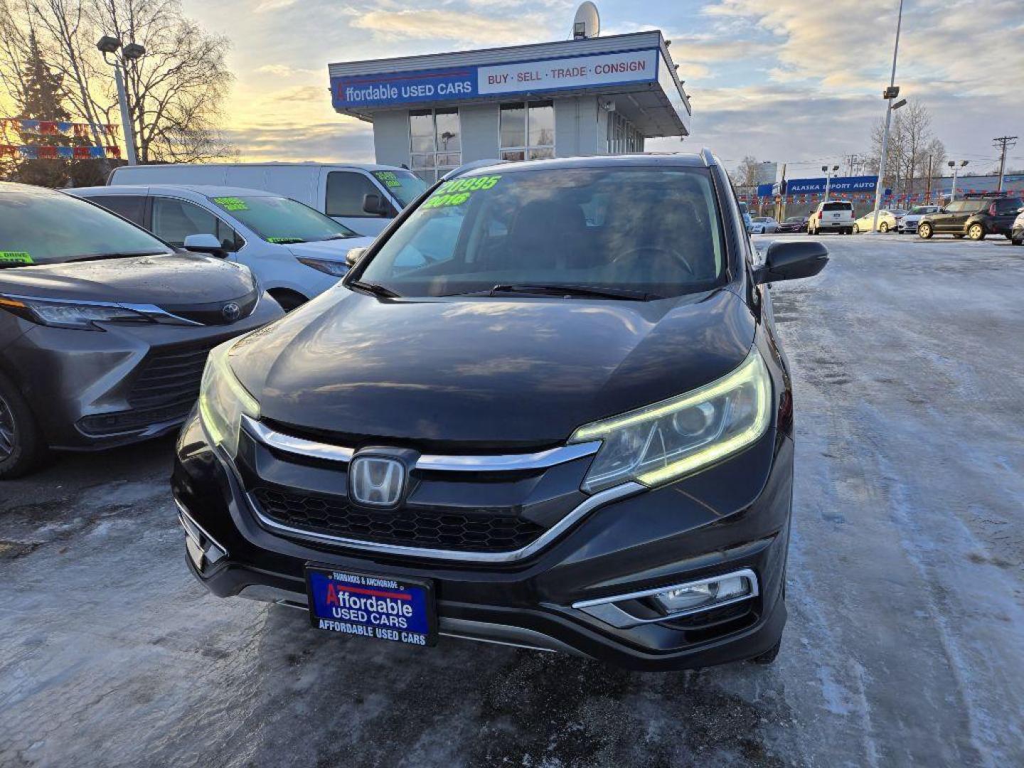 2016 BLACK HONDA CR-V TOURING (5J6RM4H90GL) with an 2.4L engine, Continuously Variable transmission, located at 929 East 8th Ave, Anchorage, AK, 99501, (907) 274-2277, 61.214783, -149.866074 - Photo#0