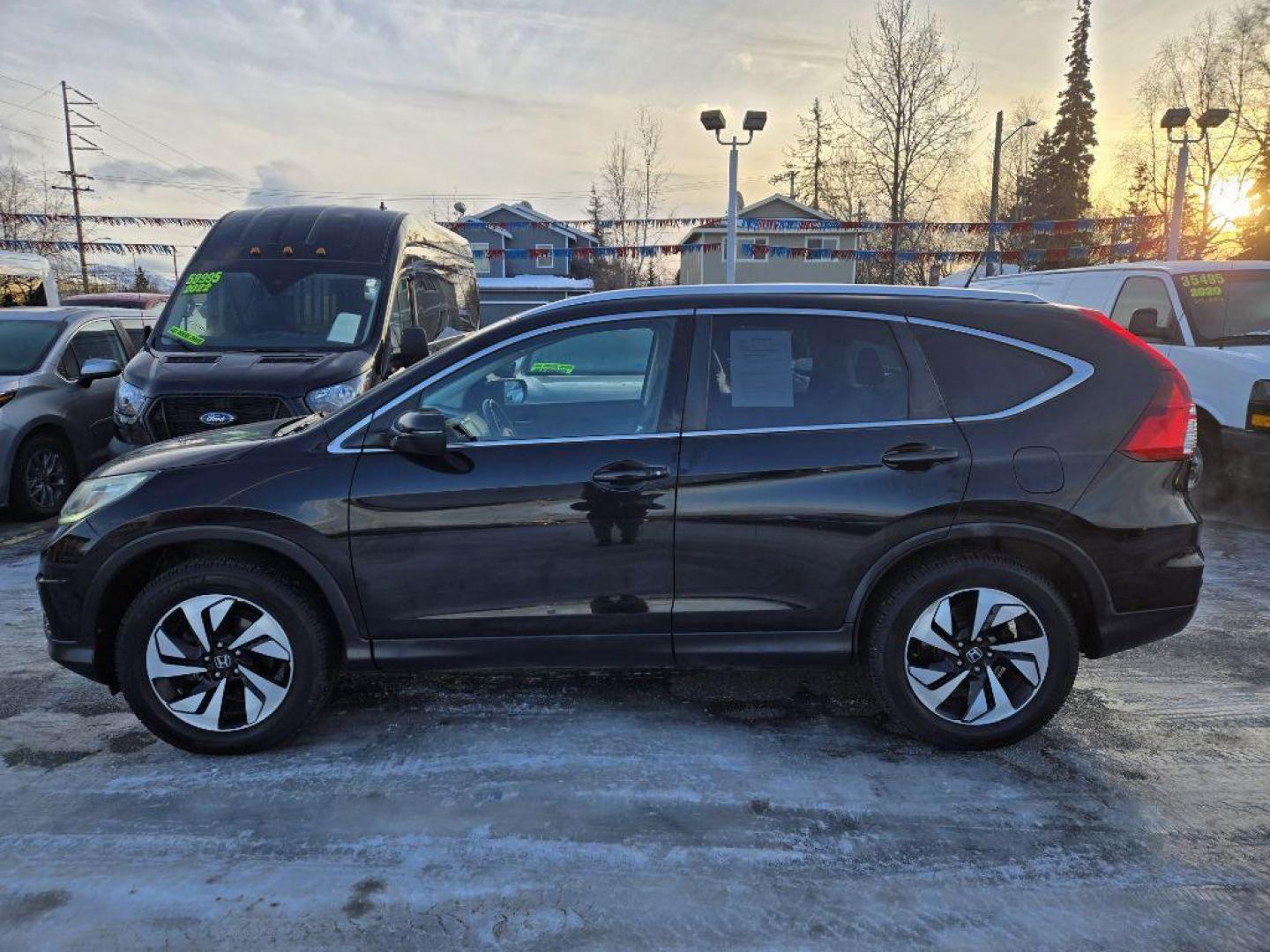 2016 BLACK HONDA CR-V TOURING (5J6RM4H90GL) with an 2.4L engine, Continuously Variable transmission, located at 929 East 8th Ave, Anchorage, AK, 99501, (907) 274-2277, 61.214783, -149.866074 - Photo#1