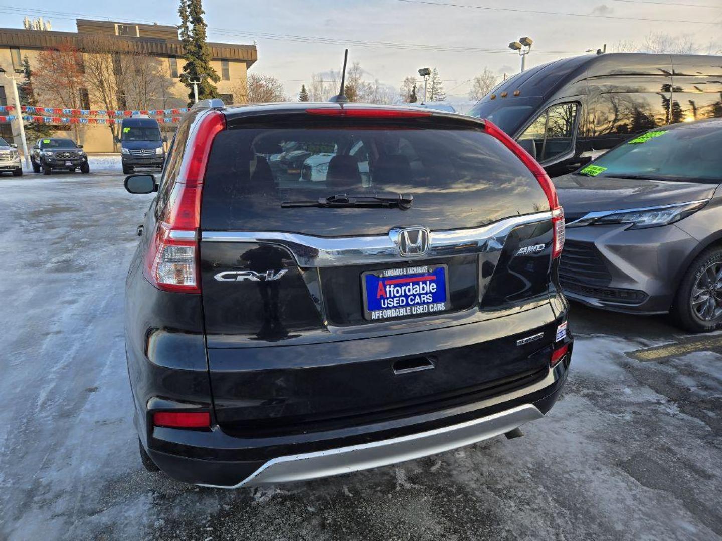 2016 BLACK HONDA CR-V TOURING (5J6RM4H90GL) with an 2.4L engine, Continuously Variable transmission, located at 929 East 8th Ave, Anchorage, AK, 99501, (907) 274-2277, 61.214783, -149.866074 - Photo#2