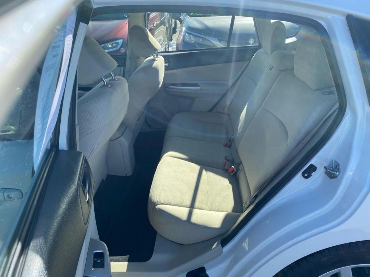 2016 WHITE SUBARU IMPREZA PREMIUM (JF1GPAB64G8) with an 2.0L engine, Continuously Variable transmission, located at 929 East 8th Ave, Anchorage, AK, 99501, (907) 274-2277, 61.214783, -149.866074 - Photo#3