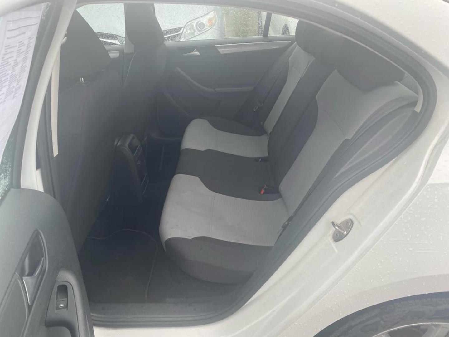 2017 WHITE VOLKSWAGEN JETTA S (3VW2B7AJ6HM) with an 1.4L engine, Automatic transmission, located at 929 East 8th Ave, Anchorage, AK, 99501, (907) 274-2277, 61.214783, -149.866074 - Photo#3