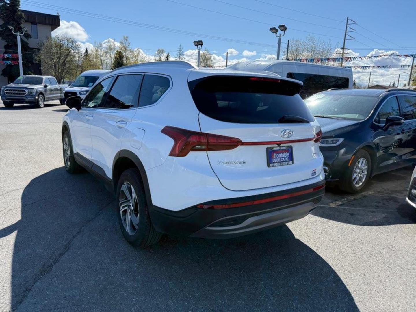 2023 WHITE HYUNDAI SANTA FE SEL SEL (5NMS2DAJ9PH) with an 2.5L engine, Automatic transmission, located at 929 East 8th Ave, Anchorage, AK, 99501, (907) 274-2277, 61.214783, -149.866074 - Photo#2
