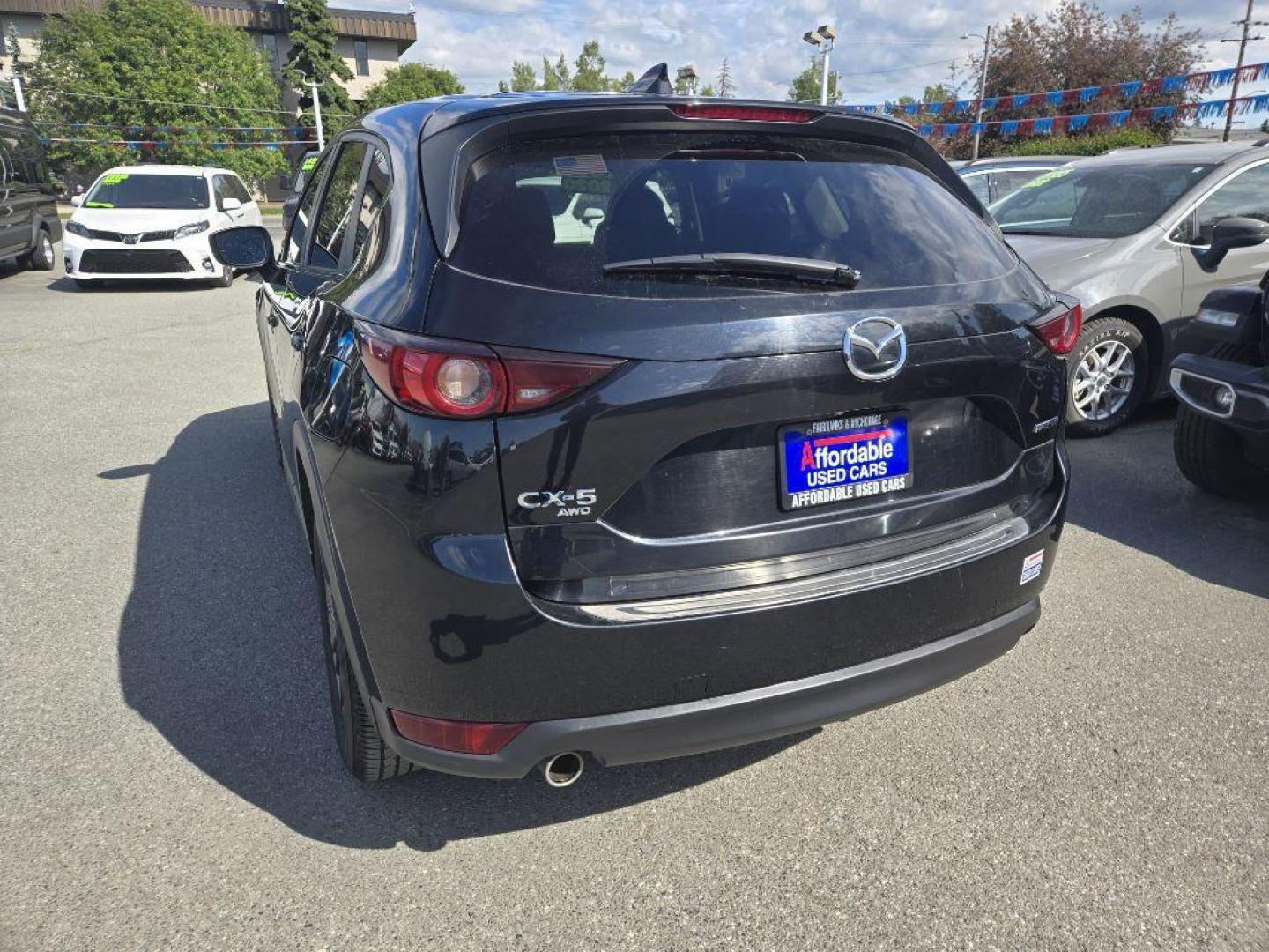 2020 BLACK MAZDA CX-5 TOURING (JM3KFBCMXL0) with an 2.5L engine, Automatic transmission, located at 929 East 8th Ave, Anchorage, AK, 99501, (907) 274-2277, 61.214783, -149.866074 - Photo#2