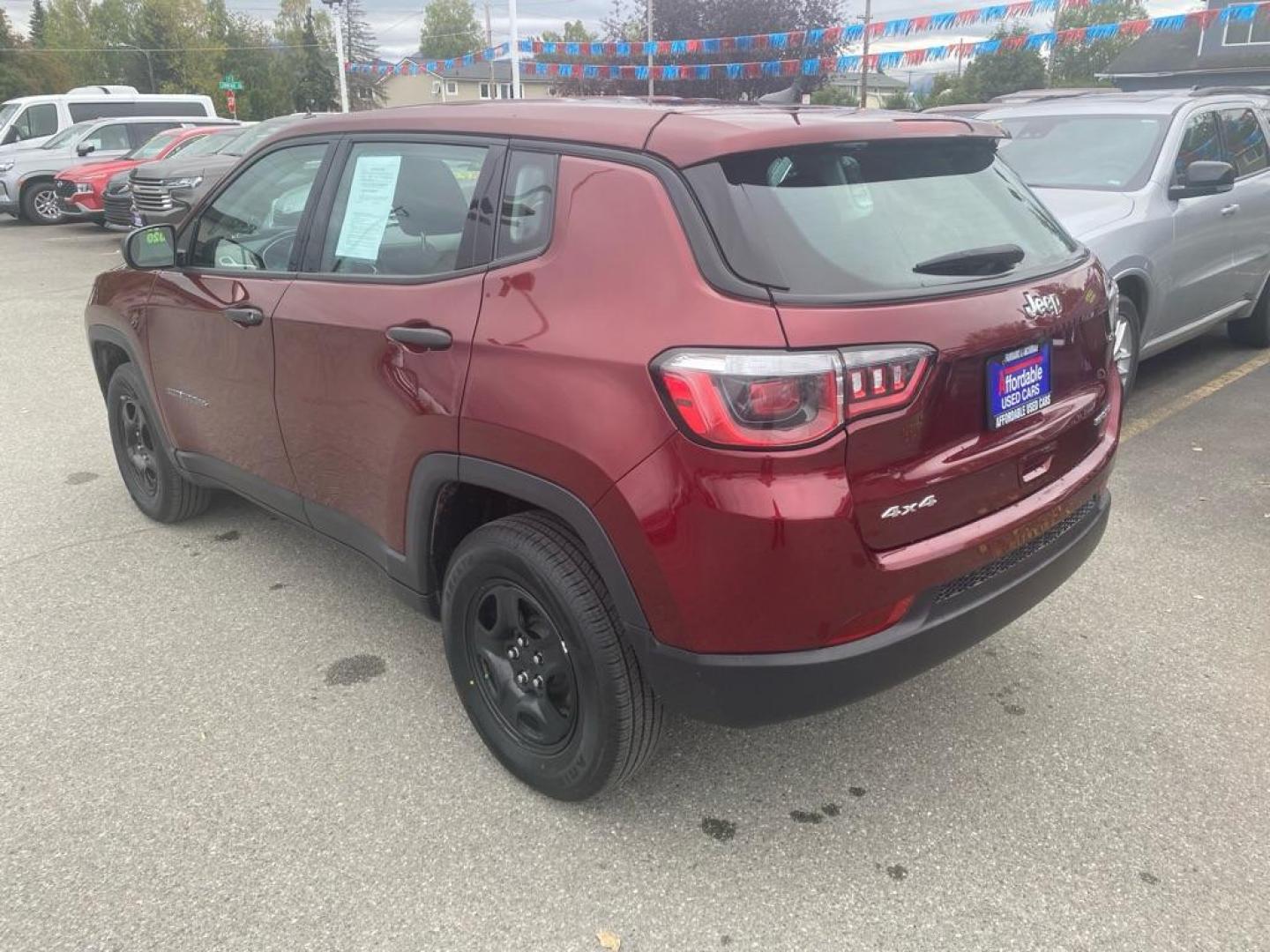 2020 MAROON JEEP COMPASS SPORT (3C4NJDAB7LT) with an 2.4L engine, Automatic transmission, located at 929 East 8th Ave, Anchorage, AK, 99501, (907) 274-2277, 61.214783, -149.866074 - Photo#2