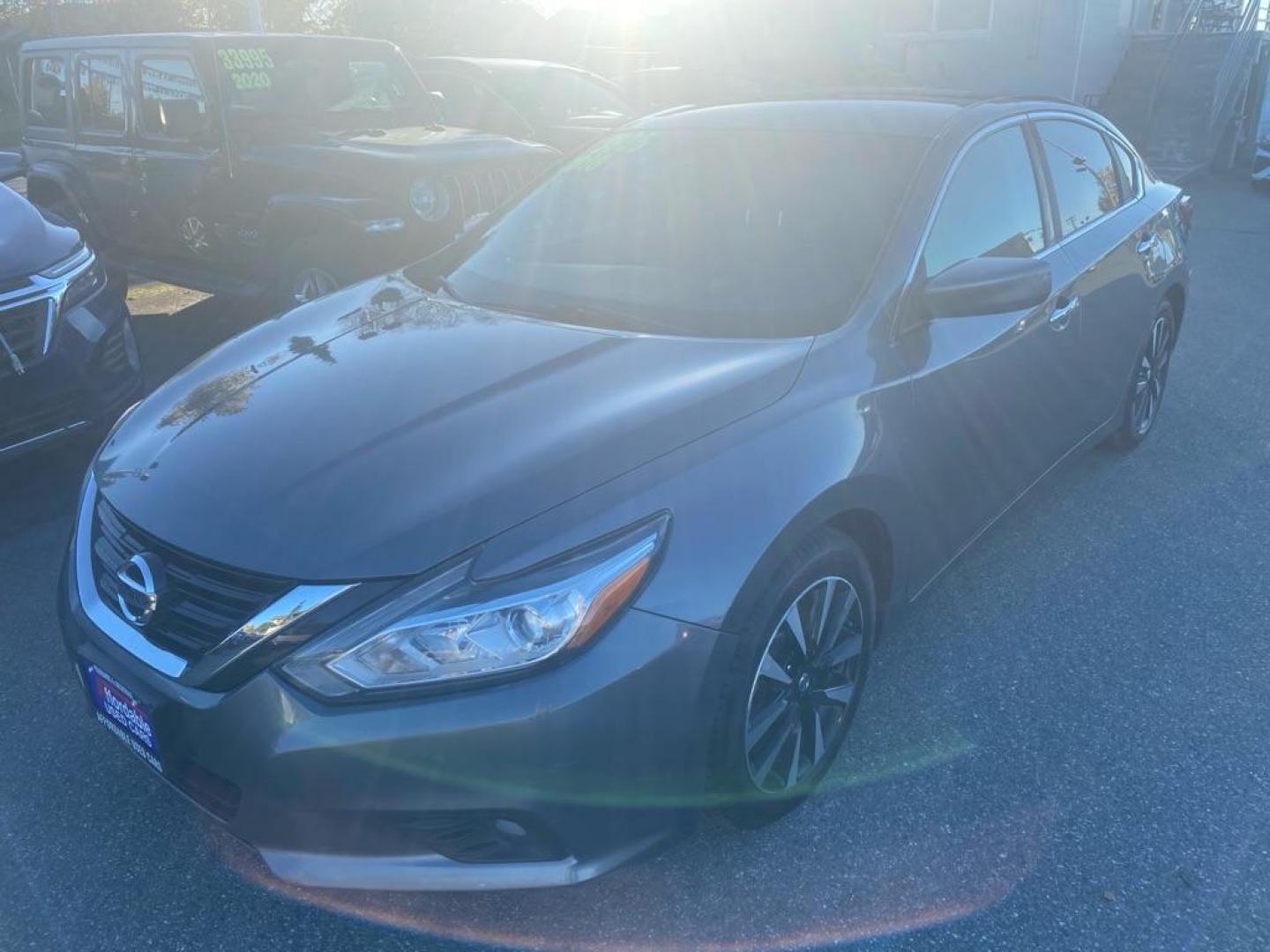 2018 GRAY NISSAN ALTIMA 2.5 (1N4AL3AP0JC) with an 2.5L engine, Continuously Variable transmission, located at 929 East 8th Ave, Anchorage, AK, 99501, (907) 274-2277, 61.214783, -149.866074 - Photo#0