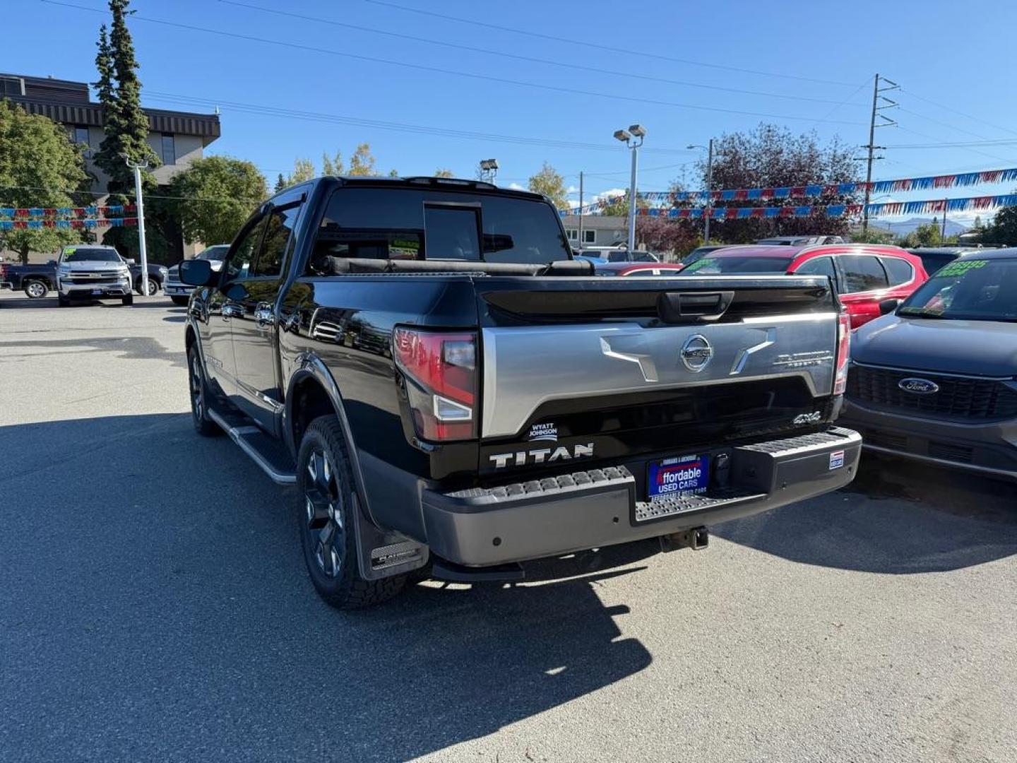 2020 BLACK NISSAN TITAN PLATINUM (1N6AA1ED1LN) with an 5.6L engine, Automatic transmission, located at 929 East 8th Ave, Anchorage, AK, 99501, (907) 274-2277, 61.214783, -149.866074 - Photo#2