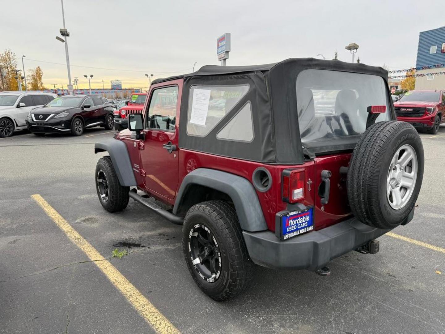 2013 MAROON JEEP WRANGLER SPORT (1C4AJWAG4DL) with an 3.6L engine, Automatic transmission, located at 929 East 8th Ave, Anchorage, AK, 99501, (907) 274-2277, 61.214783, -149.866074 - Photo#4