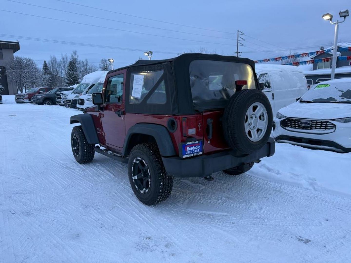2013 MAROON JEEP WRANGLER SPORT (1C4AJWAG4DL) with an 3.6L engine, Automatic transmission, located at 929 East 8th Ave, Anchorage, AK, 99501, (907) 274-2277, 61.214783, -149.866074 - Photo#2