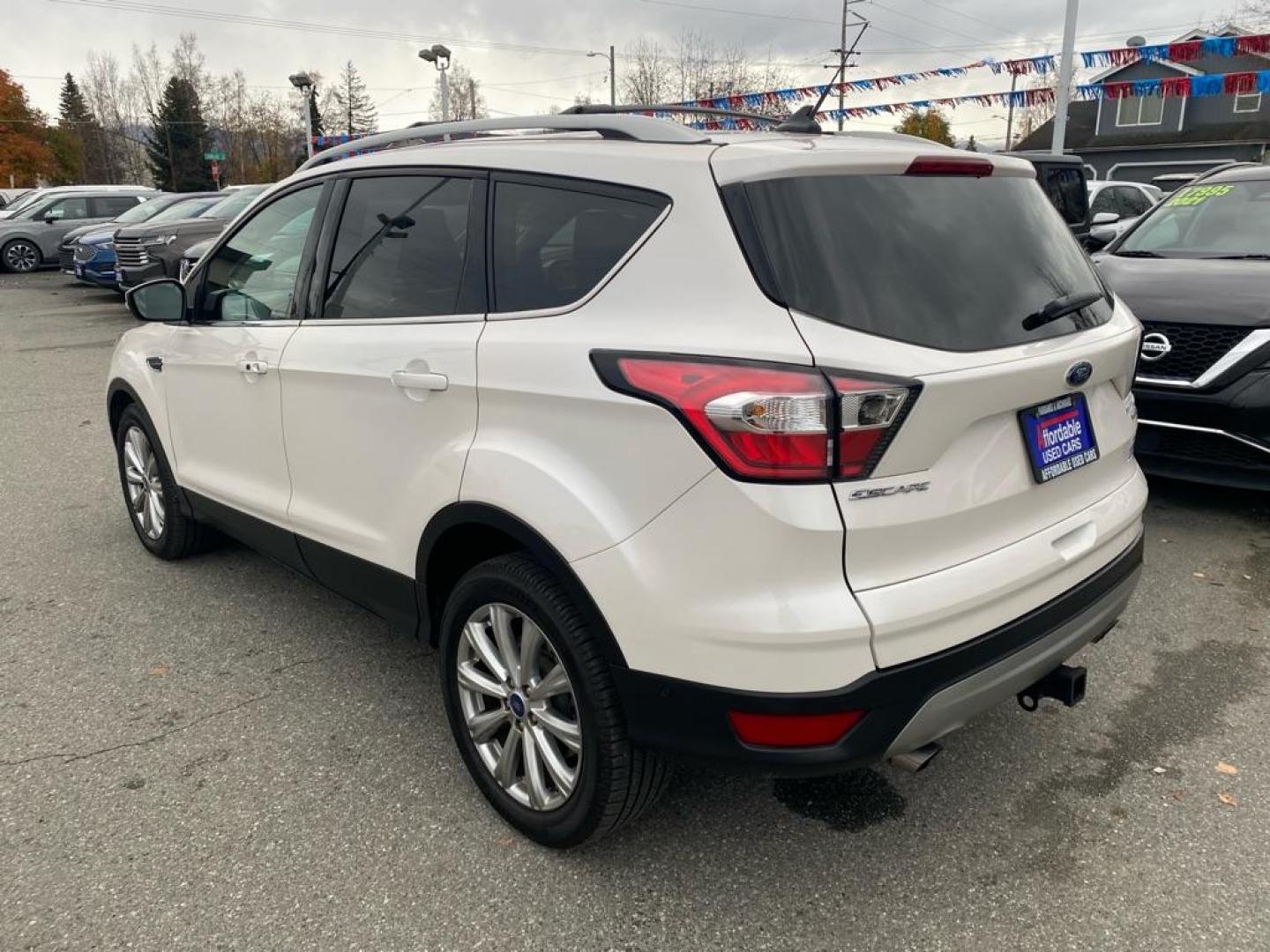 2018 WHITE FORD ESCAPE TITANIUM TITANIUM (1FMCU9J91JU) with an 2.0L engine, Automatic transmission, located at 929 East 8th Ave, Anchorage, AK, 99501, (907) 274-2277, 61.214783, -149.866074 - Photo#2