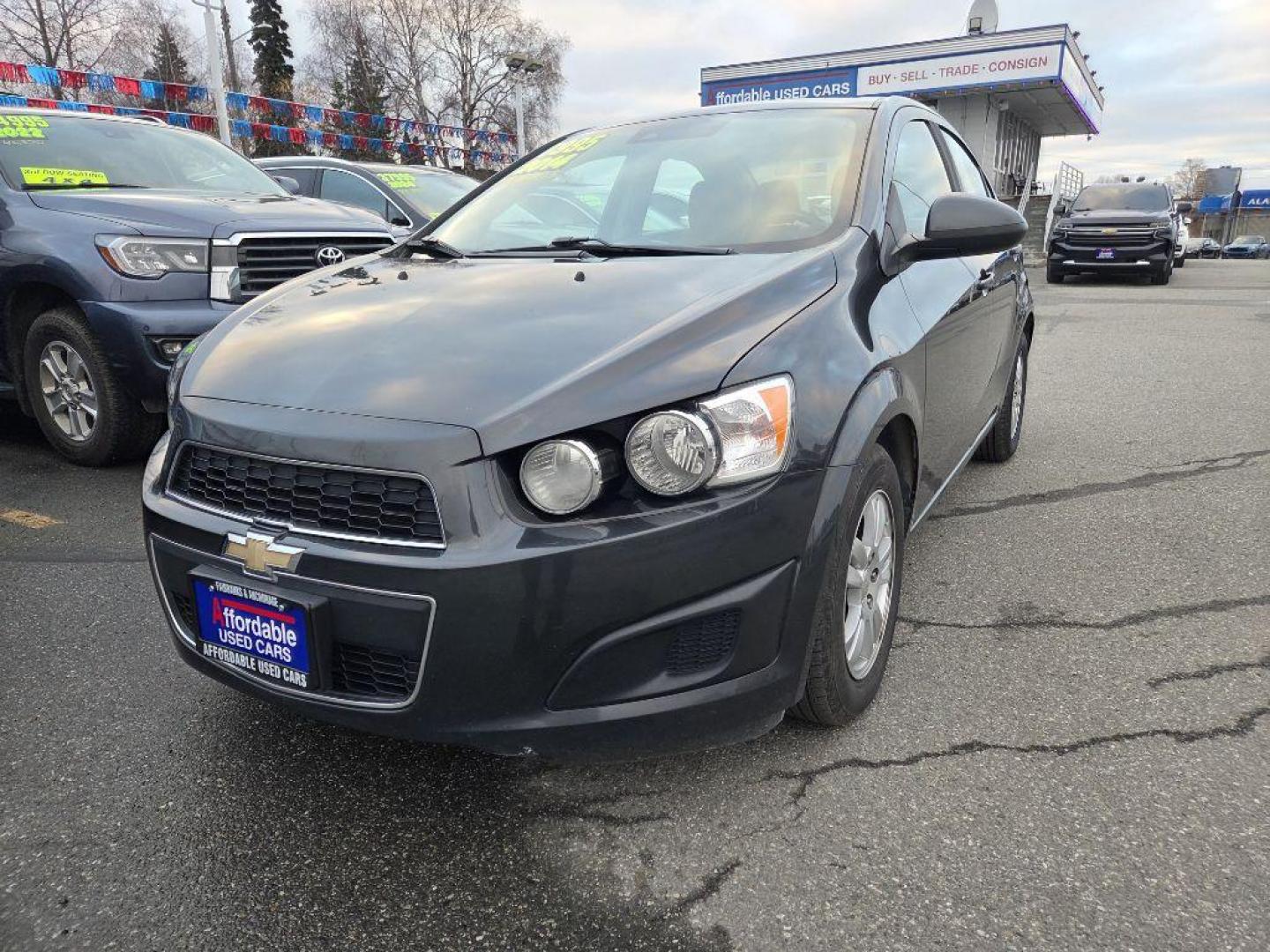 2014 GRAY CHEVROLET SONIC LT (1G1JD5SB3E4) with an 1.4L engine, 5-Speed Manual transmission, located at 929 East 8th Ave, Anchorage, AK, 99501, (907) 274-2277, 61.214783, -149.866074 - Photo#0
