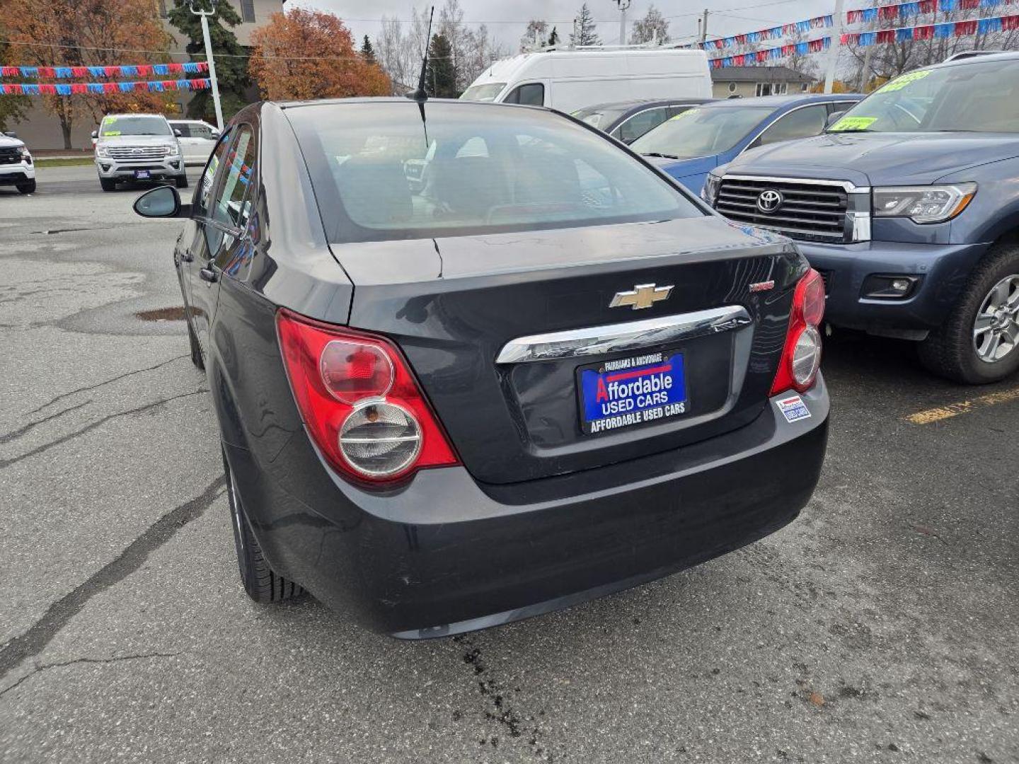 2014 GRAY CHEVROLET SONIC LT (1G1JD5SB3E4) with an 1.4L engine, 5-Speed Manual transmission, located at 929 East 8th Ave, Anchorage, AK, 99501, (907) 274-2277, 61.214783, -149.866074 - Photo#2