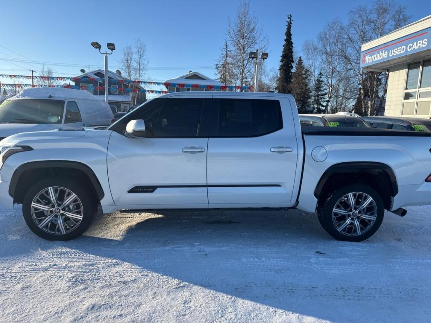 2024 WHITE TOYOTA TUNDRA CREWMAX PLATINUM (5TFNC5DB4RX) with an 3.4L engine, Automatic transmission, located at 929 East 8th Ave, Anchorage, AK, 99501, (907) 274-2277, 61.214783, -149.866074 - Photo#1