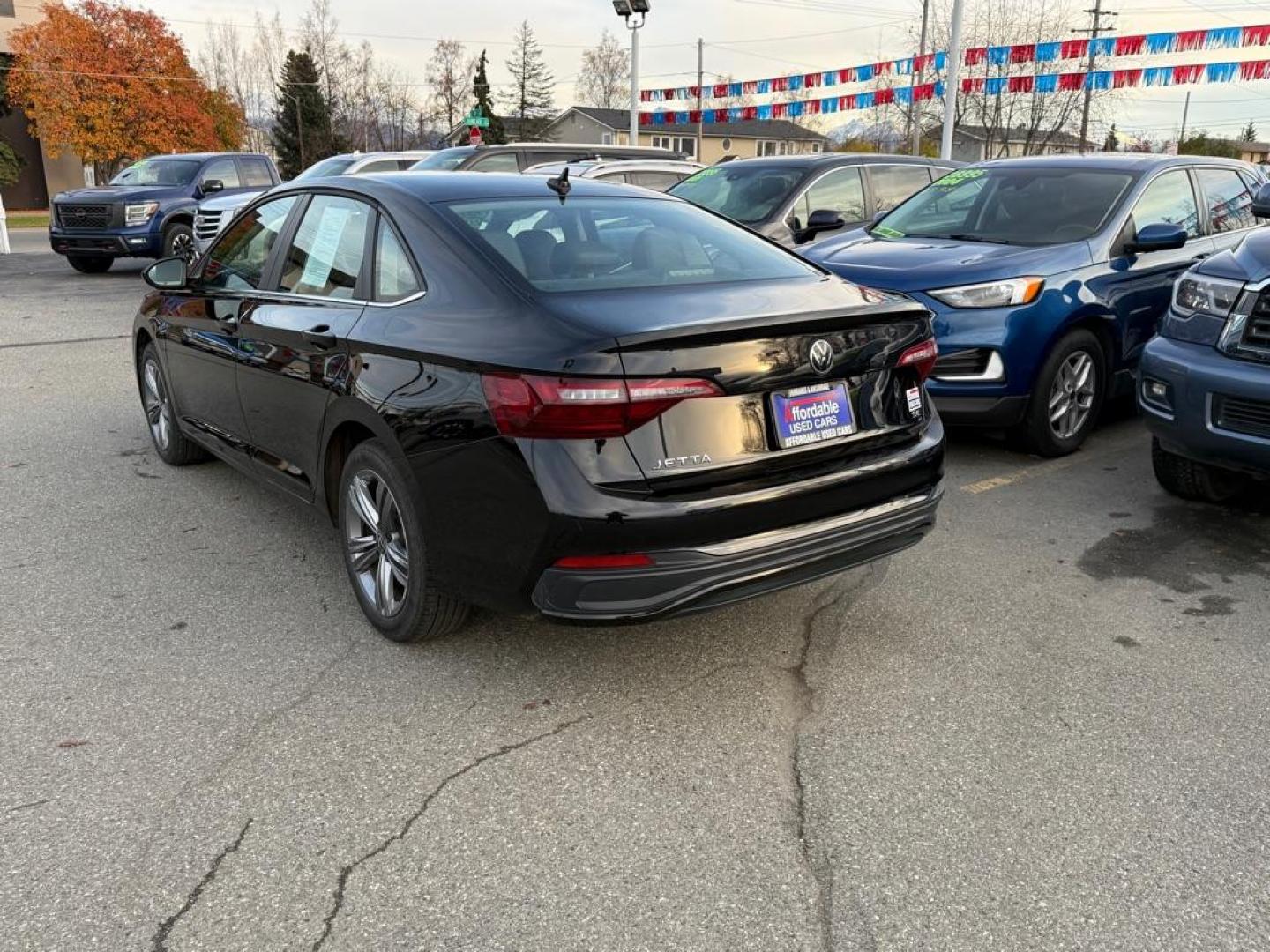 2024 BLACK VOLKSWAGEN JETTA SE SE (3VWEM7BU0RM) with an 1.5L engine, Automatic transmission, located at 929 East 8th Ave, Anchorage, AK, 99501, (907) 274-2277, 61.214783, -149.866074 - Photo#2