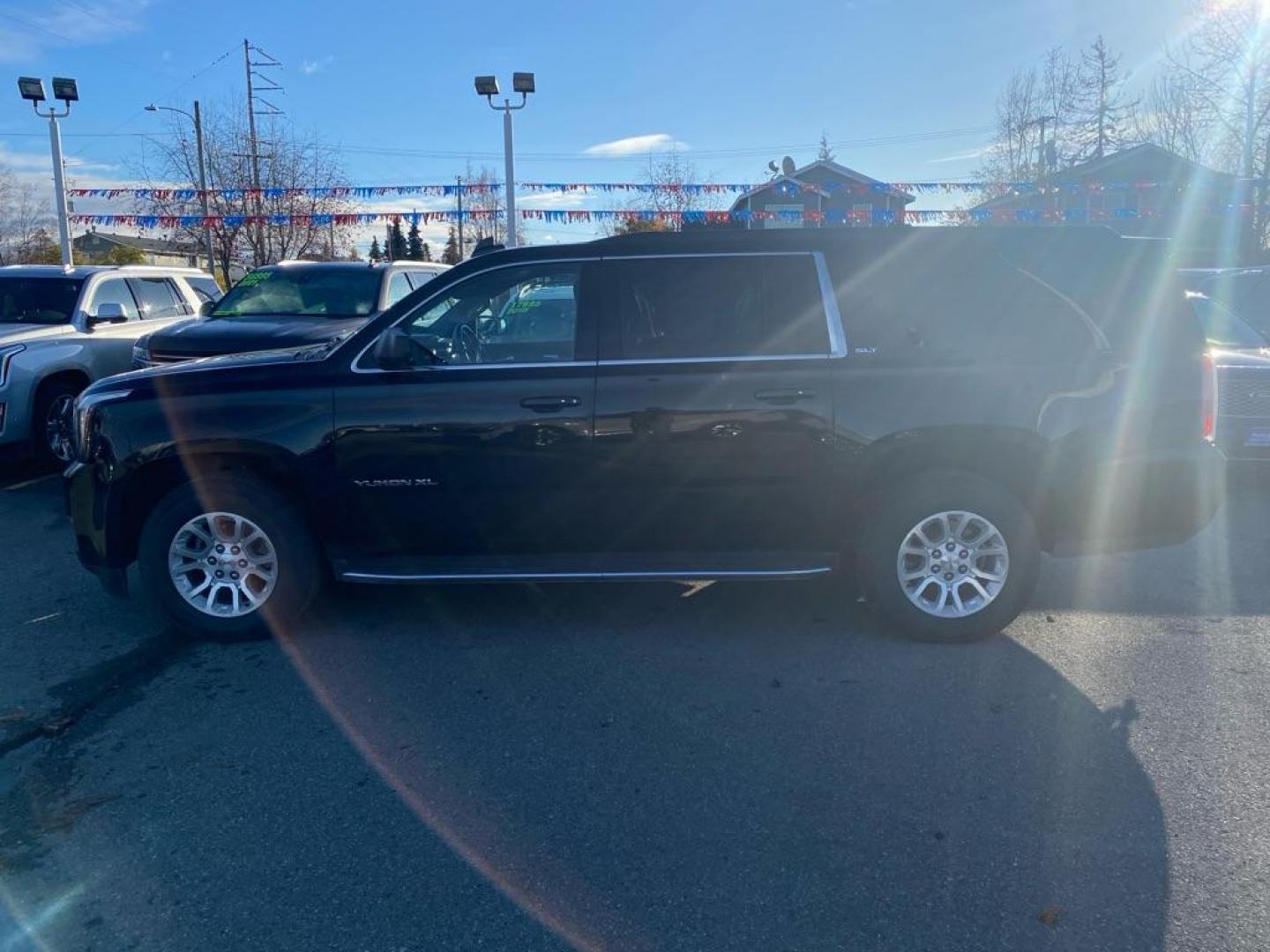2019 BLACK GMC YUKON XL 1500 SLT (1GKS2GKC0KR) with an 5.3L engine, Automatic transmission, located at 929 East 8th Ave, Anchorage, AK, 99501, (907) 274-2277, 61.214783, -149.866074 - Photo#1