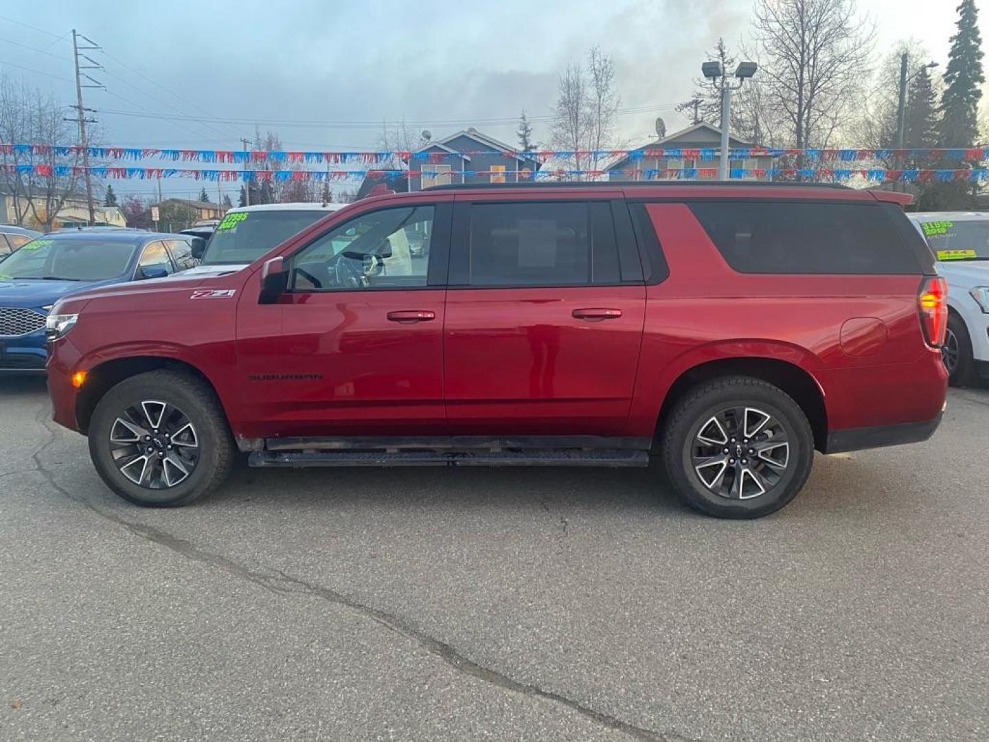 2021 MAROON CHEVROLET SUBURBAN 1500 Z71 (1GNSKDKD7MR) with an 5.3L engine, Automatic transmission, located at 929 East 8th Ave, Anchorage, AK, 99501, (907) 274-2277, 61.214783, -149.866074 - Photo#1