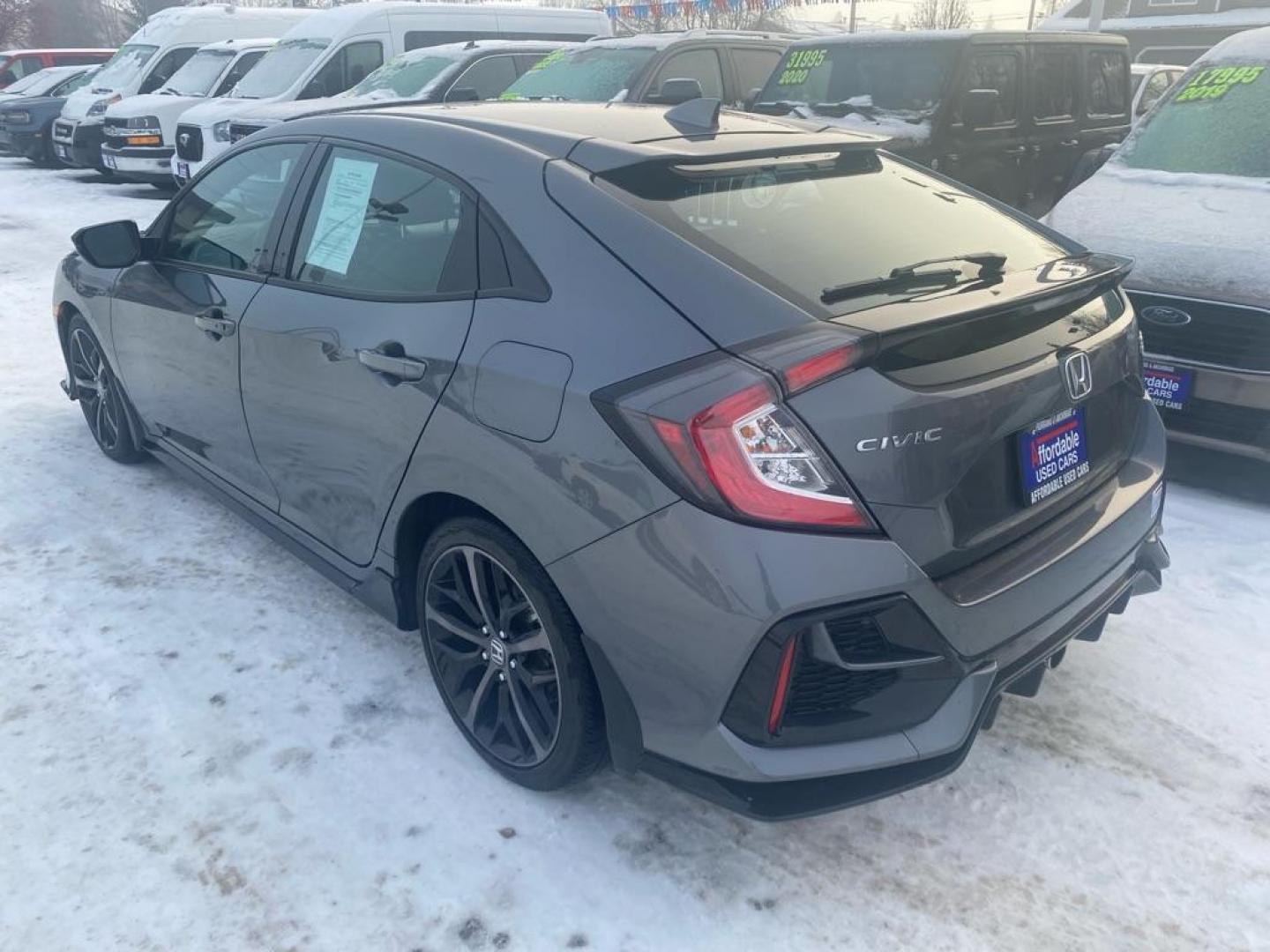 2020 GRAY HONDA CIVIC SPORT TOURING (SHHFK7H95LU) with an 1.5L engine, Continuously Variable transmission, located at 929 East 8th Ave, Anchorage, AK, 99501, (907) 274-2277, 61.214783, -149.866074 - Photo#2