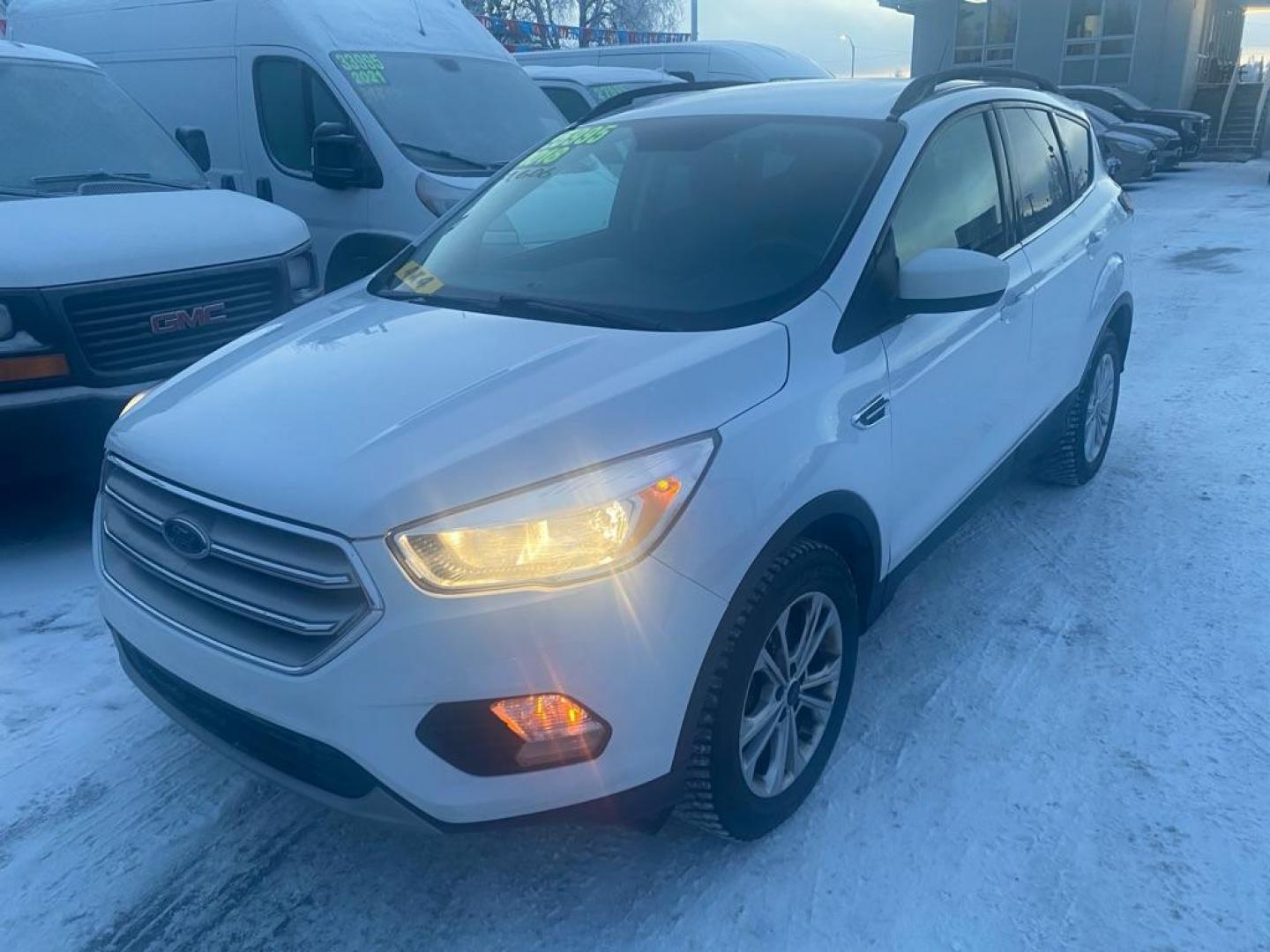2018 WHITE FORD ESCAPE SE (1FMCU9GD3JU) with an 1.5L engine, Automatic transmission, located at 929 East 8th Ave, Anchorage, AK, 99501, (907) 274-2277, 61.214783, -149.866074 - Photo#0