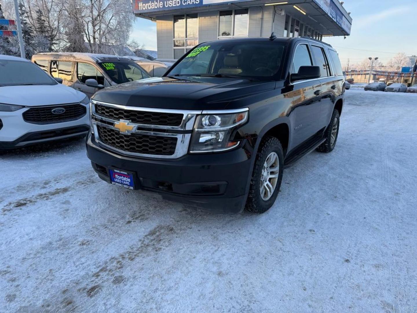 2017 BLACK CHEVROLET TAHOE 1500 LT (1GNSKBKC3HR) with an 5.3L engine, Automatic transmission, located at 929 East 8th Ave, Anchorage, AK, 99501, (907) 274-2277, 61.214783, -149.866074 - Photo#0