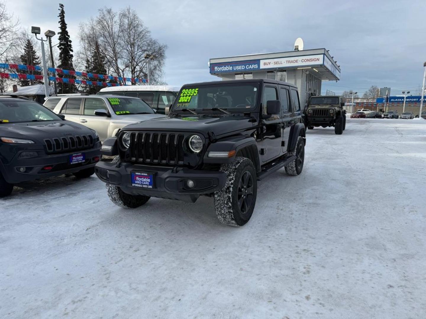 2021 BLACK JEEP WRANGLER UNLIMI SAHARA (1C4HJXEN4MW) with an 2.0L engine, Automatic transmission, located at 929 East 8th Ave, Anchorage, AK, 99501, (907) 274-2277, 61.214783, -149.866074 - Photo#0