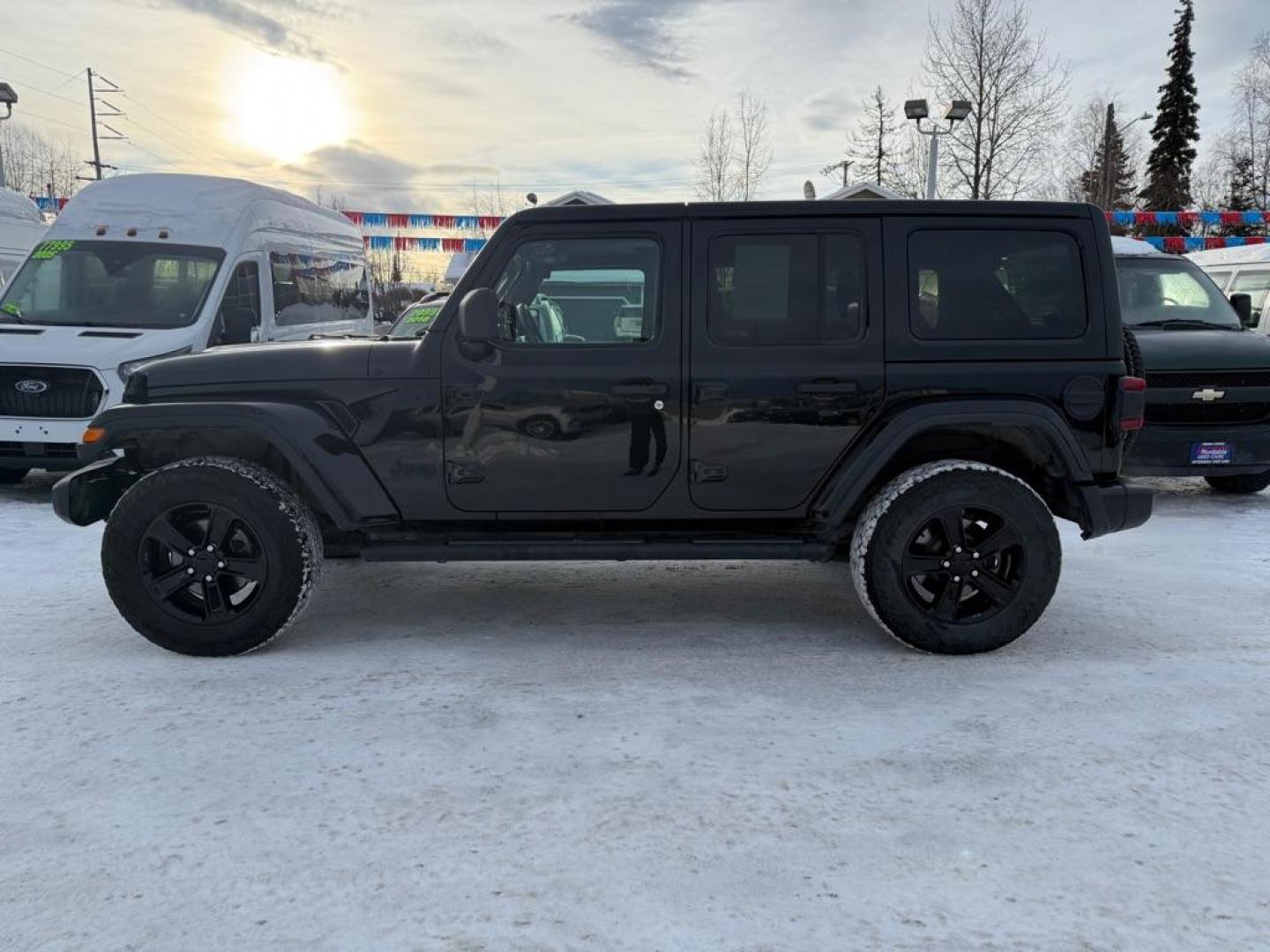 2021 BLACK JEEP WRANGLER UNLIMI SAHARA (1C4HJXEN4MW) with an 2.0L engine, Automatic transmission, located at 929 East 8th Ave, Anchorage, AK, 99501, (907) 274-2277, 61.214783, -149.866074 - Photo#1