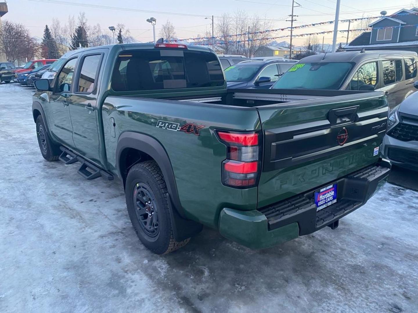 2026 GREEN NISSAN FRONTIER PRO-4X CREW CAB (1N6ED1FKXTN) , Automatic transmission, located at 929 East 8th Ave, Anchorage, AK, 99501, (907) 274-2277, 61.214783, -149.866074 - Photo#2
