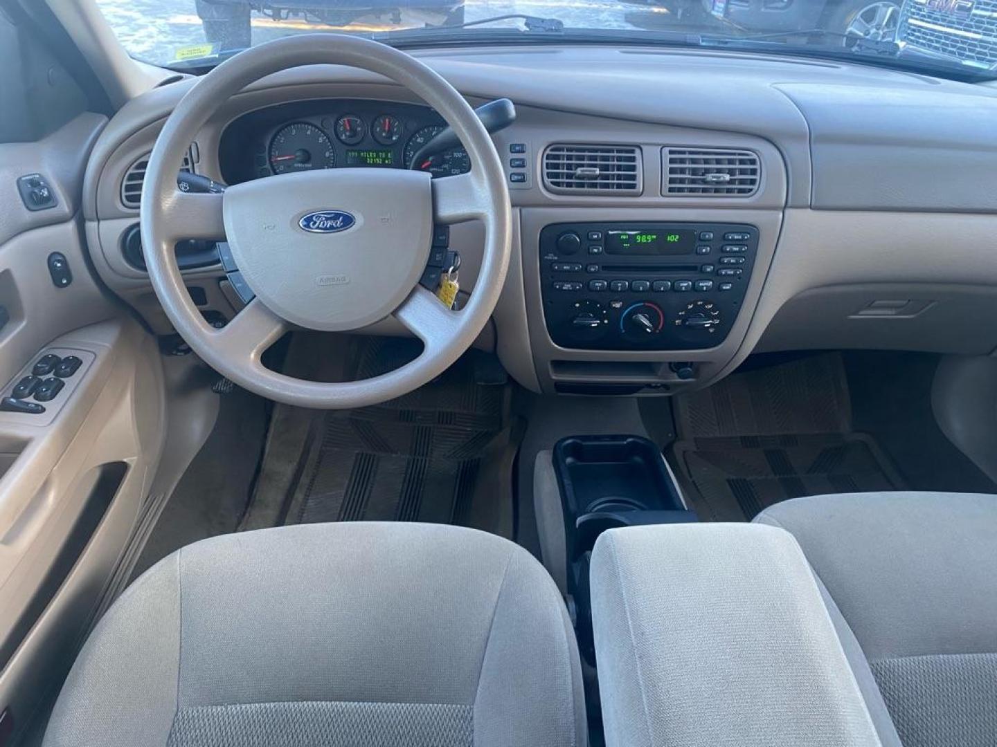 2007 BLUE FORD TAURUS SE (1FAFP53U07A) with an 3.0L engine, Automatic transmission, located at 929 East 8th Ave, Anchorage, AK, 99501, (907) 274-2277, 61.214783, -149.866074 - Photo#4
