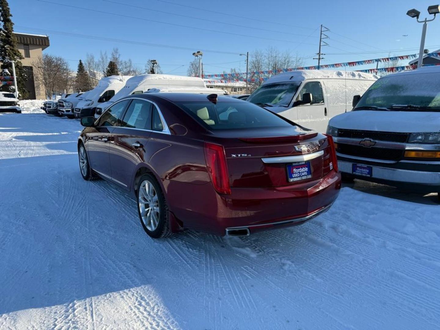 2016 MAROON CADILLAC XTS PREMIUM COLLECTION (2G61R5S37G9) with an 3.6L engine, Automatic transmission, located at 929 East 8th Ave, Anchorage, AK, 99501, (907) 274-2277, 61.214783, -149.866074 - Photo#2