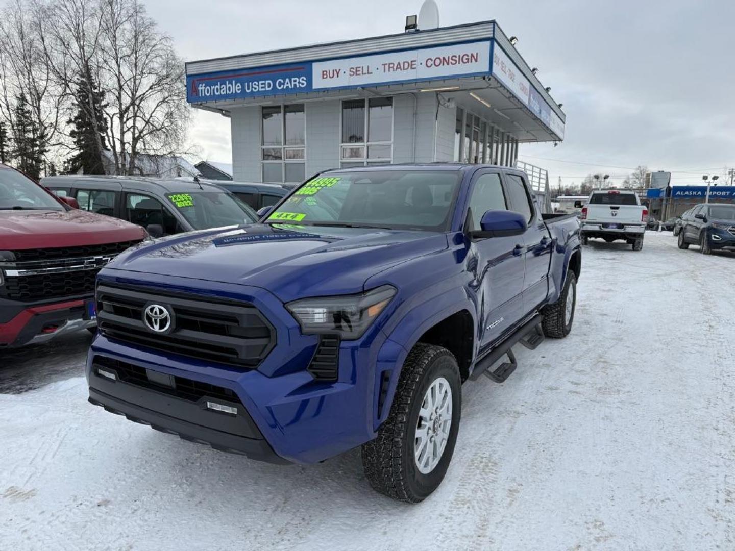 2025 BLUE TOYOTA TACOMA DOUBLE CAB LB (3TMLB5JN1SM) with an 2.4L engine, Automatic transmission, located at 929 East 8th Ave, Anchorage, AK, 99501, (907) 274-2277, 61.214783, -149.866074 - Photo#0