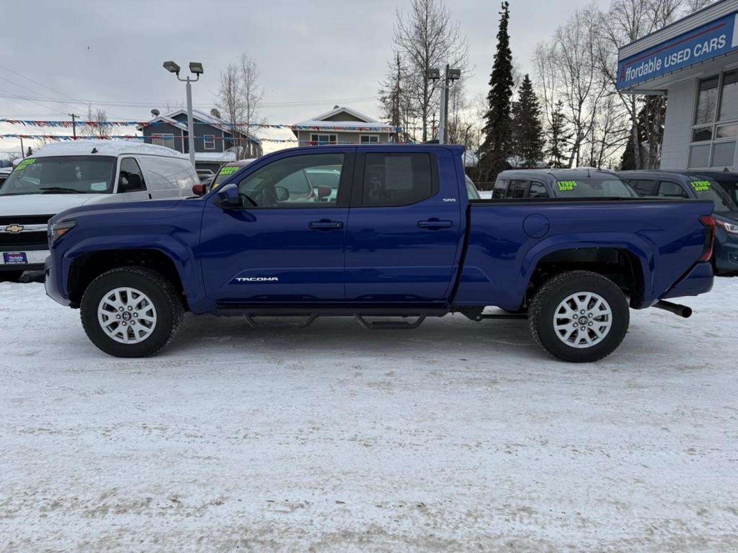 2025 BLUE TOYOTA TACOMA DOUBLE CAB LB (3TMLB5JN1SM) with an 2.4L engine, Automatic transmission, located at 929 East 8th Ave, Anchorage, AK, 99501, (907) 274-2277, 61.214783, -149.866074 - Photo#1