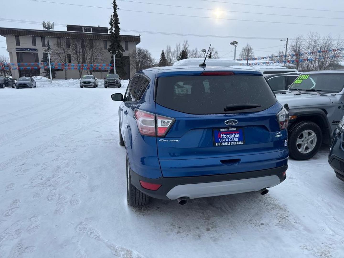 2017 BLUE FORD ESCAPE SE (1FMCU9GD2HU) with an 1.5L engine, Automatic transmission, located at 929 East 8th Ave, Anchorage, AK, 99501, (907) 274-2277, 61.214783, -149.866074 - Photo#2
