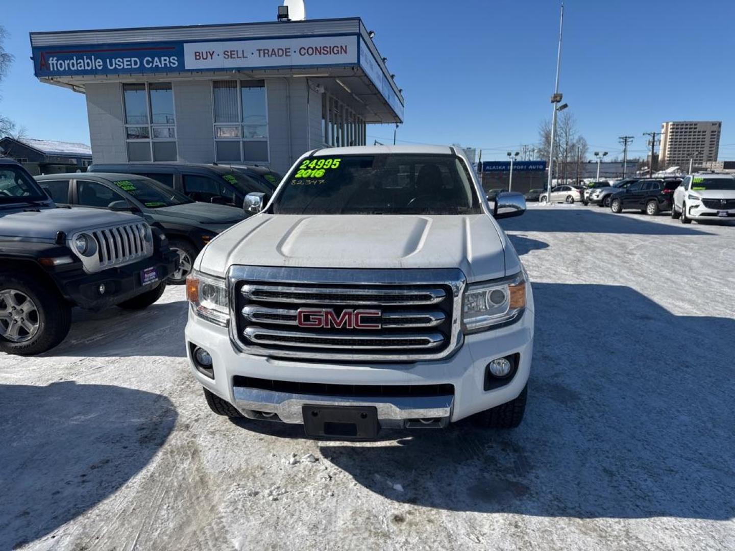 2016 WHITE GMC CANYON SLT (1GTG6DE38G1) with an 3.6L engine, Automatic transmission, located at 929 East 8th Ave, Anchorage, AK, 99501, (907) 274-2277, 61.214783, -149.866074 - Photo#0