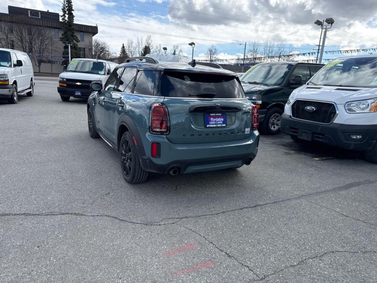 2023 GREEN MINI COOPER S COUNTRYMAN ALL4 (WMZ83BR09P3) with an 2.0L engine, Automatic transmission, located at 929 East 8th Ave, Anchorage, AK, 99501, (907) 274-2277, 61.214783, -149.866074 - Photo#4