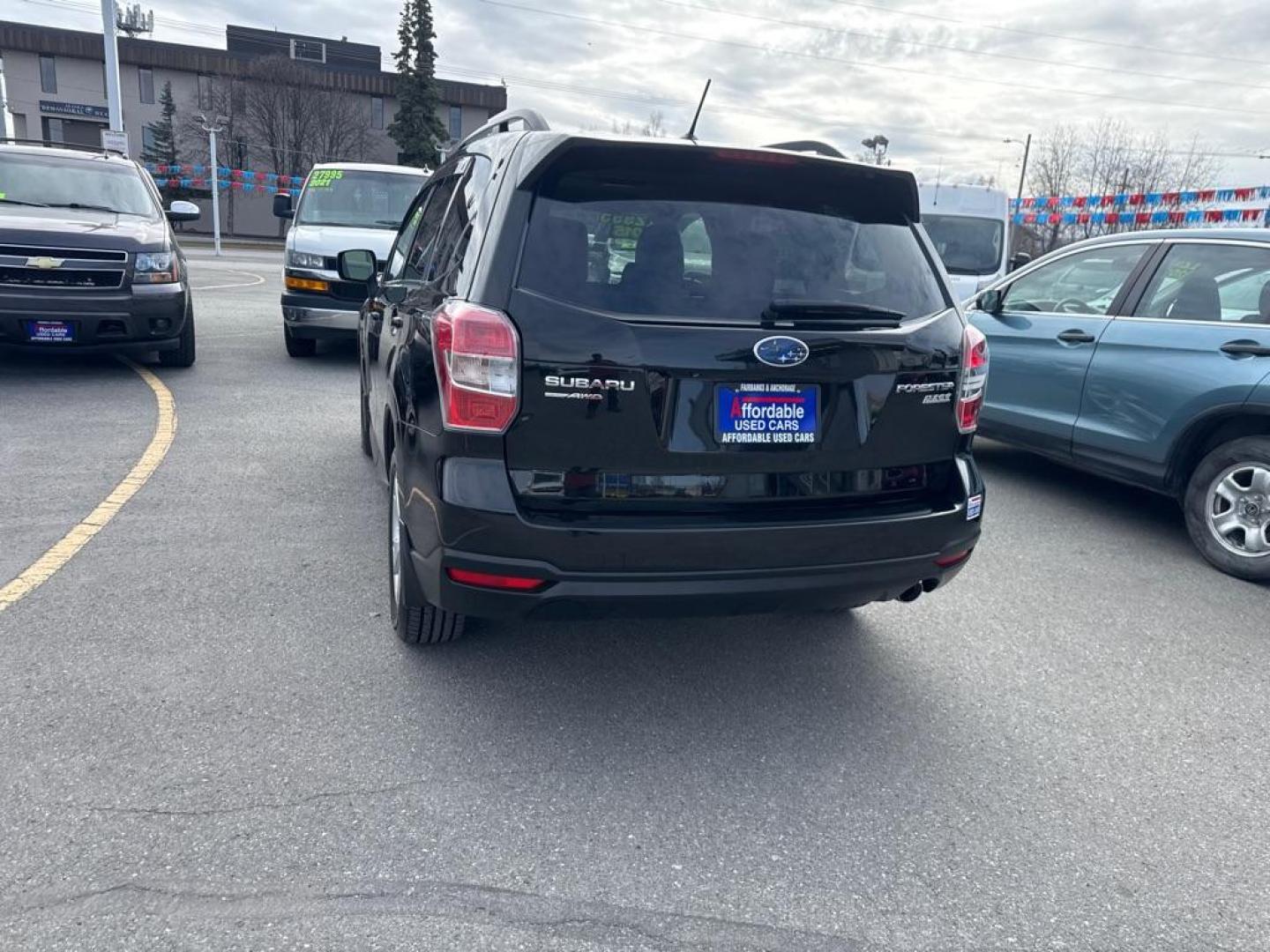 2015 BLACK SUBARU FORESTER 2.5I LIMITED (JF2SJAHC8FH) with an 2.5L engine, Continuously Variable transmission, located at 929 East 8th Ave, Anchorage, AK, 99501, (907) 274-2277, 61.214783, -149.866074 - Photo#4