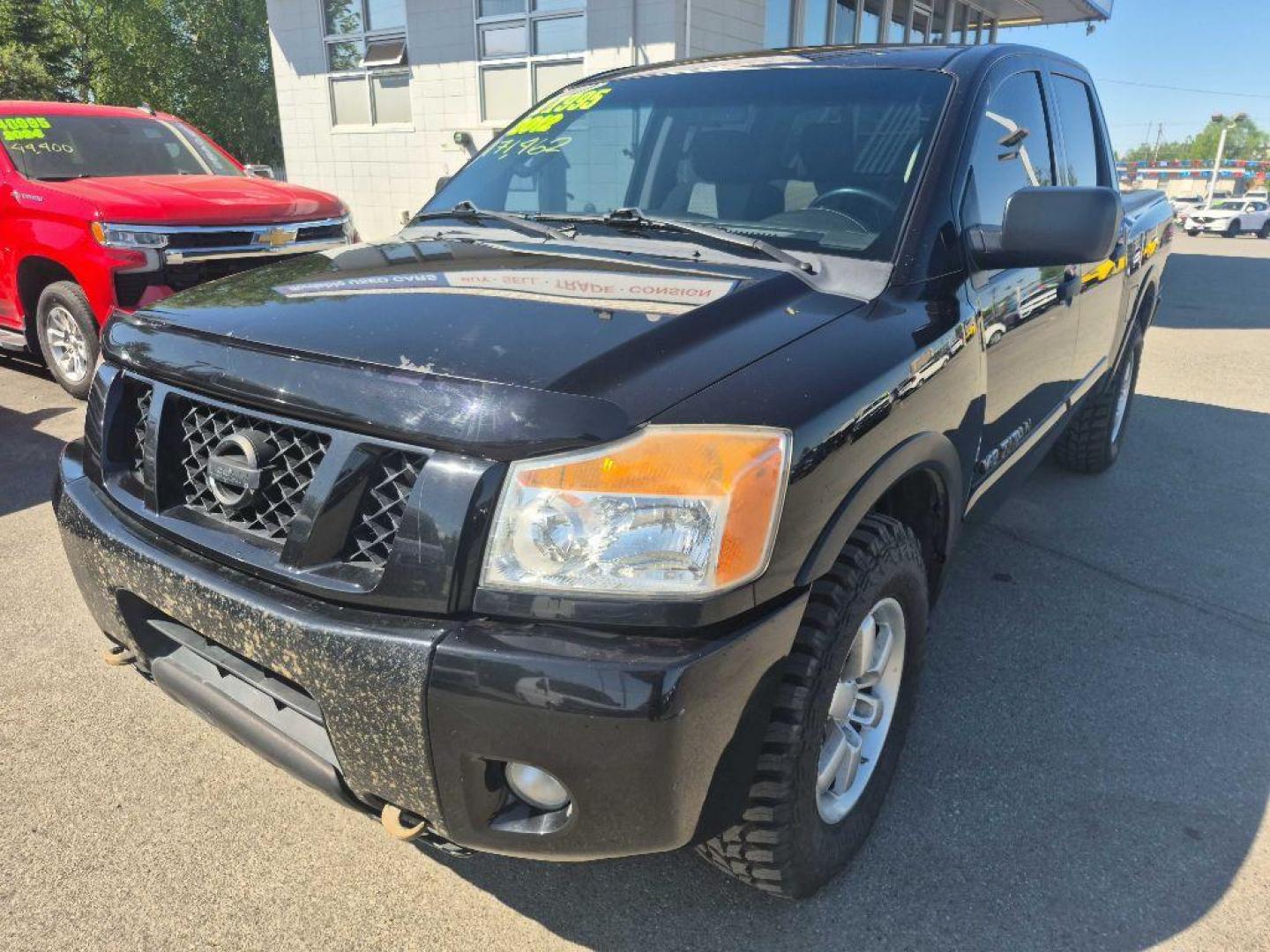 2012 BLACK NISSAN TITAN S (1N6BA0EC9CN) with an 5.6L engine, Automatic transmission, located at 929 East 8th Ave, Anchorage, AK, 99501, (907) 274-2277, 61.214783, -149.866074 - Photo#0